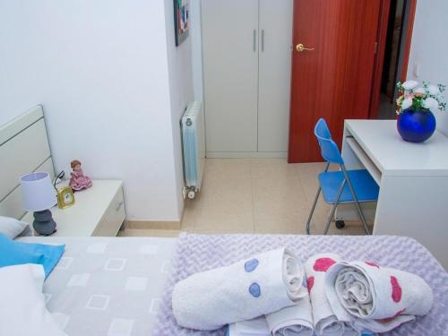 Ένα ή περισσότερα κρεβάτια σε δωμάτιο στο Winahost El balcón al mar de Cubelles