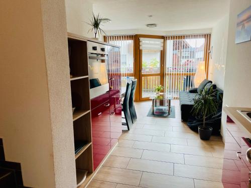 a living room with a couch and a table at Ferienwohnung Vogt in Sipplingen