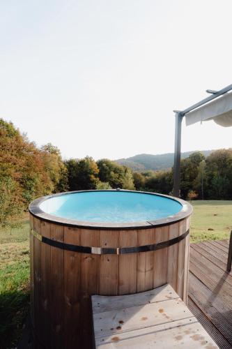 a hot tub sitting on a wooden deck at Casa Vinea in Karlovac
