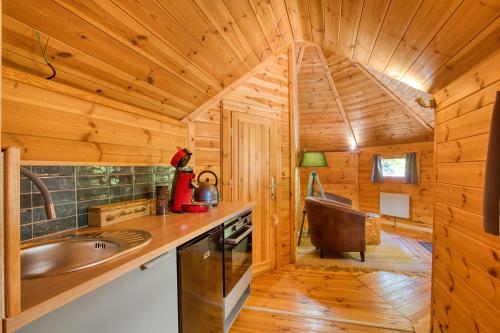 Kuchyň nebo kuchyňský kout v ubytování Grand Kota Avec Bain Nordique