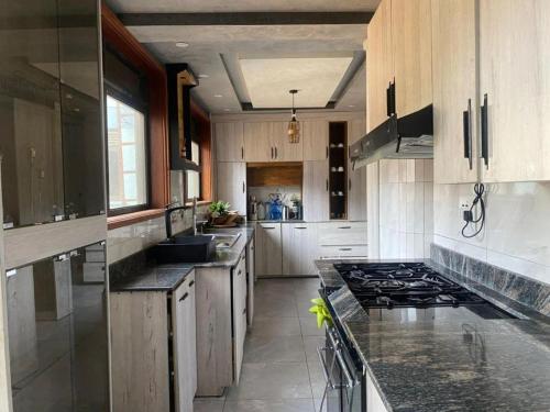 Kuchyň nebo kuchyňský kout v ubytování 7Jon Babiha