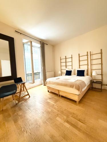 Llit o llits en una habitació de Studio Saint Germain