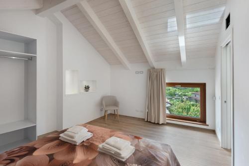 Postel nebo postele na pokoji v ubytování Residence Sulla Costa