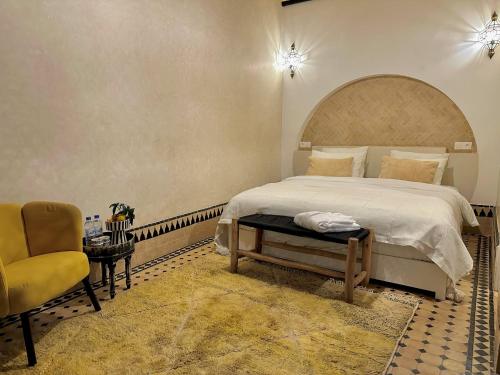 Postel nebo postele na pokoji v ubytování Riad El Badun