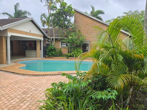 Πισίνα στο ή κοντά στο Happy Holiday Lodge