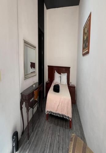 Ένα ή περισσότερα κρεβάτια σε δωμάτιο στο Apartamento Uruguay Centro Histórico