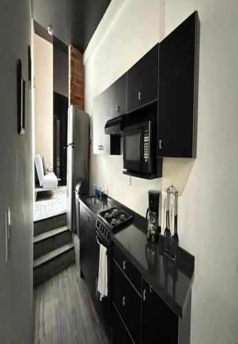 Η κουζίνα ή μικρή κουζίνα στο Apartamento Uruguay Centro Histórico