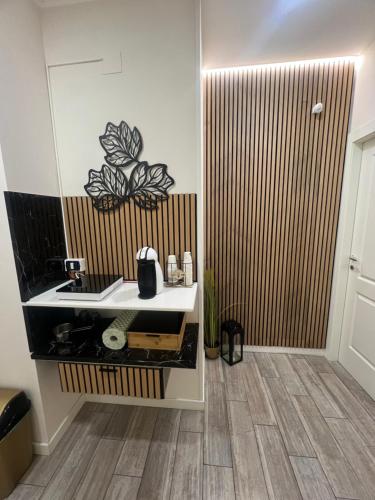 a bathroom with a sink and a shower at B&B Giordano in Porto SantʼElpidio