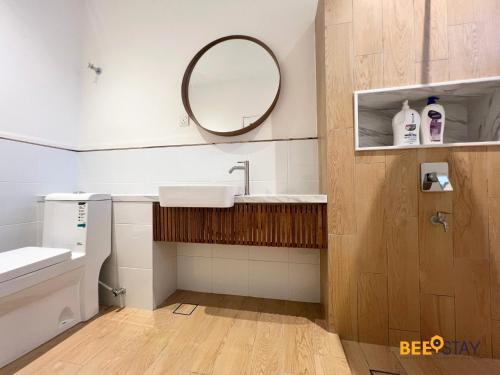 a bathroom with a sink and a mirror at SS2 Landed in Petaling Jaya for 8 Pax in Gua Sai