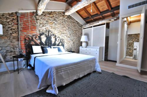 Ένα ή περισσότερα κρεβάτια σε δωμάτιο στο Villa Querceta 2Min Von Forte Dei Marmi