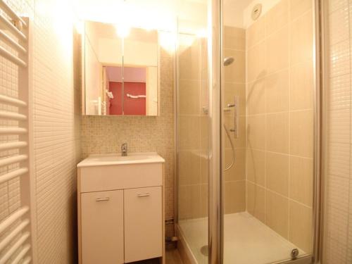 a bathroom with a sink and a shower at Studio rénové à Flaine Forêt, résidence Sirius, à 500m des pistes – 5 couchages - FR-1-687-17 in Arâches-la-Frasse