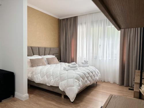 Llit o llits en una habitació de Apartment 101 Block