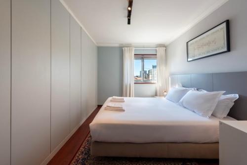 Postel nebo postele na pokoji v ubytování NEW! The Porto Wine Cellars Penthouse