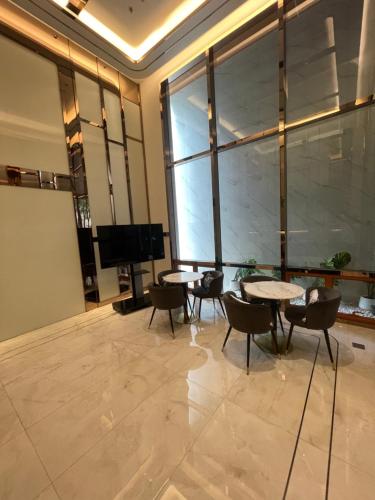 Χώρος καθιστικού στο Once芭提雅顶级豪华公寓位于21航站楼