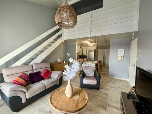 אזור ישיבה ב-Appartement duplex