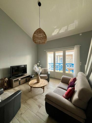 אזור ישיבה ב-Appartement duplex
