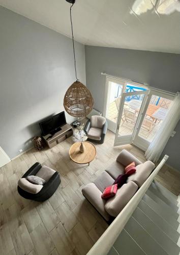 אזור ישיבה ב-Appartement duplex