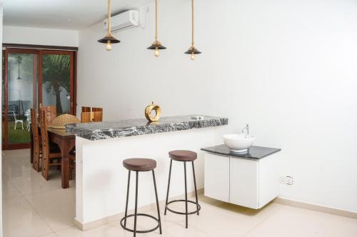 Η κουζίνα ή μικρή κουζίνα στο Cozy Escape