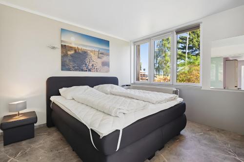 Postel nebo postele na pokoji v ubytování Ferienwohnung "Zum Segel" 1