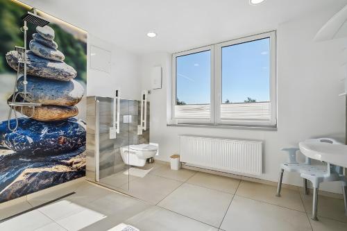 Koupelna v ubytování Ferienwohnung "Zum Segel" 1