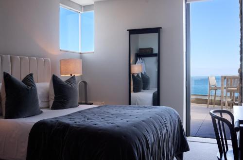 Voodi või voodid majutusasutuse Clifftops Lodge toas