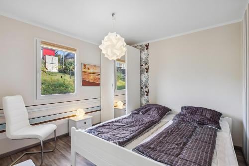 Ένα ή περισσότερα κρεβάτια σε δωμάτιο στο Ferienhaus 257