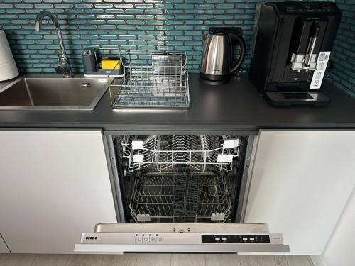 Kuchyň nebo kuchyňský kout v ubytování Nesasappartment