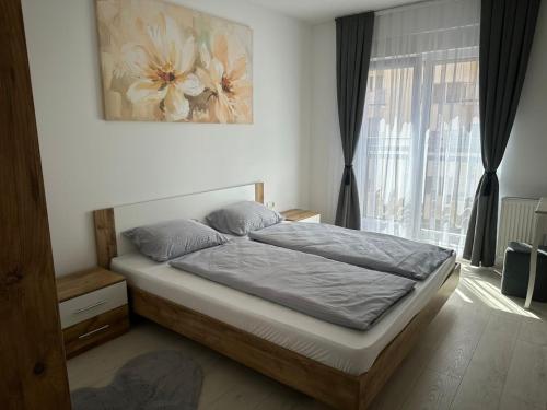 Postel nebo postele na pokoji v ubytování Nesasappartment