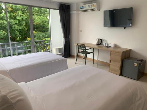 Ένα ή περισσότερα κρεβάτια σε δωμάτιο στο IU Hotel Donmueang Airport