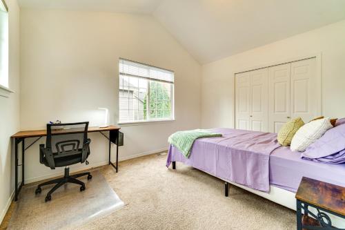 a bedroom with a bed and a desk and a window at 6 Mi to Microsoft HQ! Remote Work Retreat in Redmond