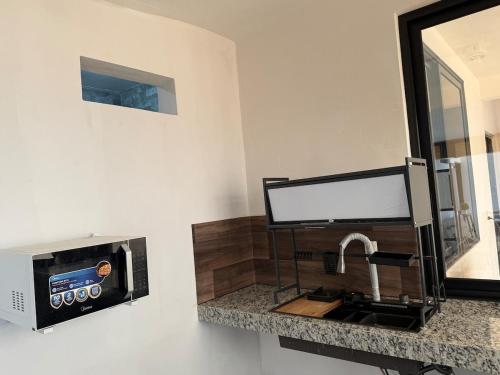 Een keuken of kitchenette bij Suite La Lomita #3 Climatizada