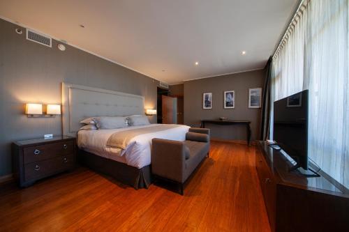 Postel nebo postele na pokoji v ubytování Hotel Parada Linares