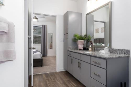a bathroom with a sink and a mirror at Stylish Stay Off I-65, Pets Welcome in Acton