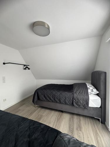 Giường trong phòng chung tại City Lounge Bielefeld 004