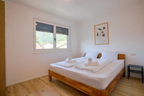 Ένα ή περισσότερα κρεβάτια σε δωμάτιο στο Naturns Apartment Mountain Suite
