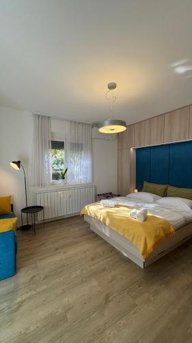 a large bedroom with a large bed in it at Studio apartma Rimljanka in Ptuj