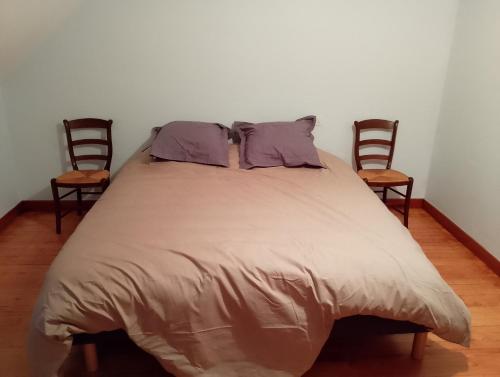 Ένα ή περισσότερα κρεβάτια σε δωμάτιο στο Gite à Cazaux - Bagnères de Luchon