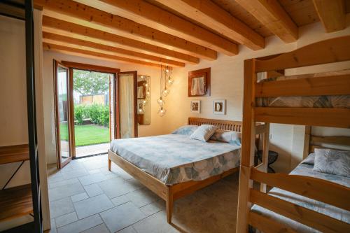a bedroom with two bunk beds in a house at Alla Rocca Storica in Cavallino-Treporti