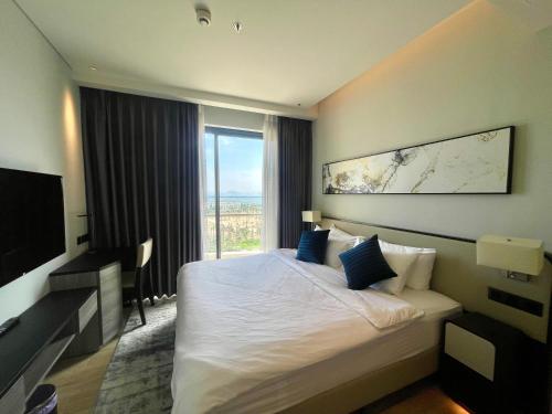 Μια τηλεόραση ή/και κέντρο ψυχαγωγίας στο Marina Suite Residence Halong