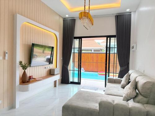 TV a/nebo společenská místnost v ubytování Jaegun Pool VIlla Aonang