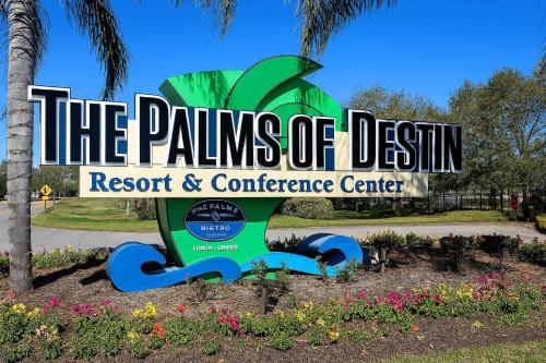 a sign for the palms of destiny resort and conference center at 5 Star Resort 11106 Fl Stunning Sunrise 2BR 2BA King Suite,Pools ,Shuttle or Walk to Beach in Destin
