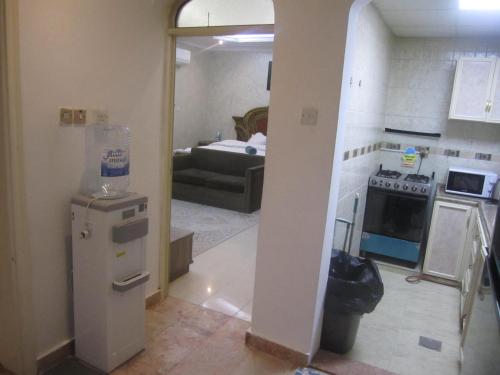 Kuchyň nebo kuchyňský kout v ubytování العين الهيلي مصباح بيت 5