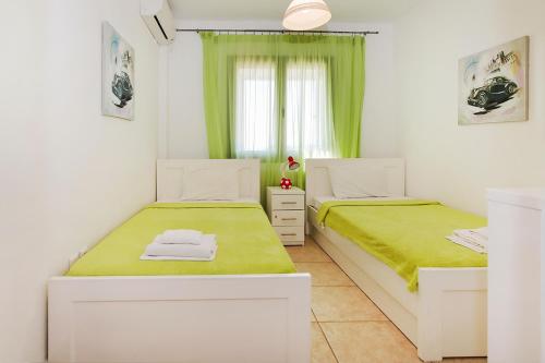 Postel nebo postele na pokoji v ubytování Villa Lion