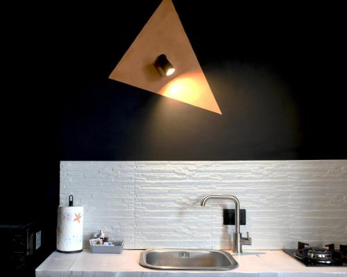 Η κουζίνα ή μικρή κουζίνα στο Appartamenti "UNIQUE" palazzo storico FAENZA