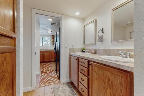 a bathroom with a sink and a shower at Mtn-View Condo w/ Resort Amenities in Tucson! in Tucson