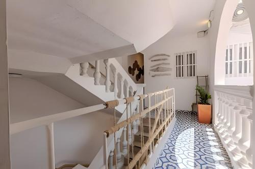 Giường trong phòng chung tại Casa Hibiscus