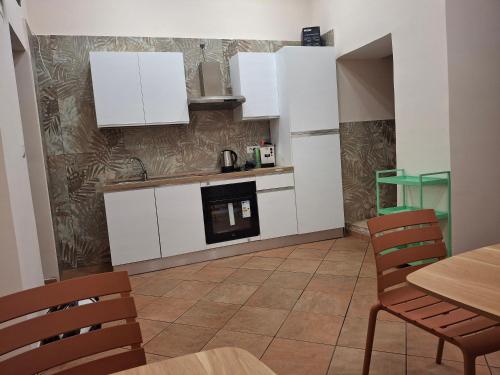 Kuchyň nebo kuchyňský kout v ubytování Il Canto della fontana