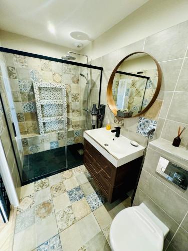 Koupelna v ubytování Chambre privée, proche Aéroport et Airbus