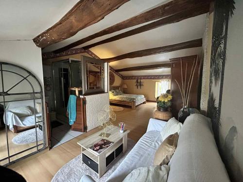 Posezení v ubytování Ancien Corps de Ferme à la Campagne