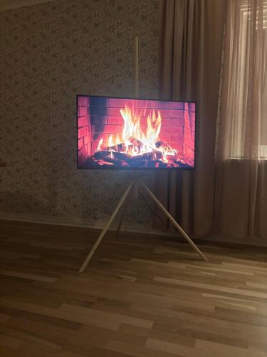 Een TV en/of entertainmentcenter bij Cozy apartment
